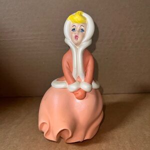 Vintage hand-painted ceramic figurine produced from an Atlantic Mold.